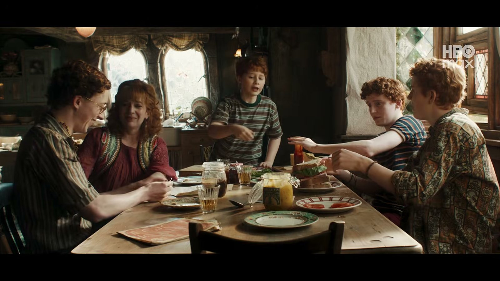 The Weasley family around the breakfast table at the Burrow in HBO's Harry Potter